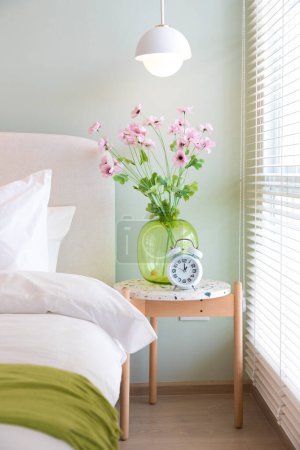 Photo for Flowers in vase  modern comfortable bedroom - Royalty Free Image