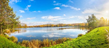 Photo for Panoramic view of autumn park on pond in Katowice, Poland - Royalty Free Image