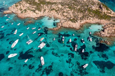 Photo for Aerial view of tourists boats offshore in the La Maddalena Archipelago in  Sardinia, Italy. - Royalty Free Image