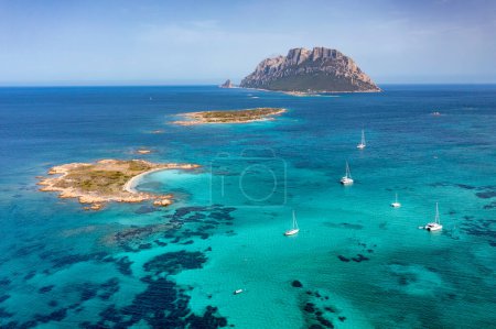 Photo for Aerial view of Tavolara Island surrounded by a clear and turquoise sea in Sardinia, Italy. - Royalty Free Image