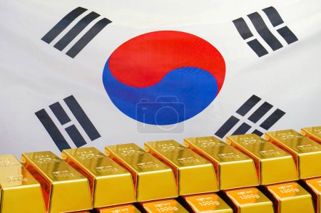 Row of shining golden bullions on the South Korea flag background. Business and financial countrys reserves. Concept of gold reserve and gold fund of South Korea