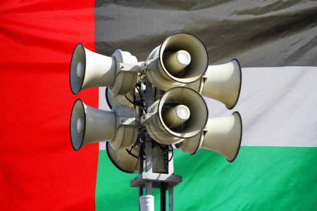 Photo for Street alarm loudspeaker on flag of United Arab Emirates background. Loudspeaker on the street. The siren of air alarm. UAE - Royalty Free Image