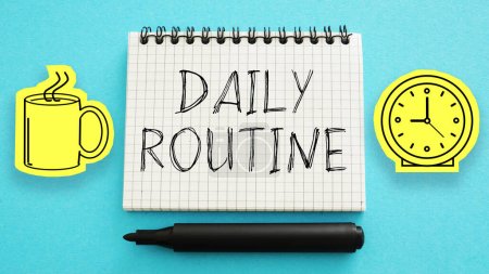 Photo for Daily routine is shown using a text - Royalty Free Image