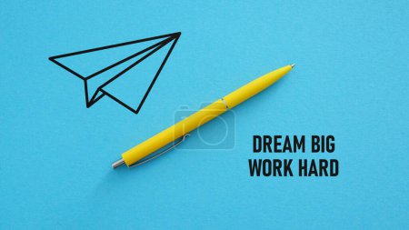 Photo for Dream Big Work Hard is shown using a text and picture of paper airplane - Royalty Free Image