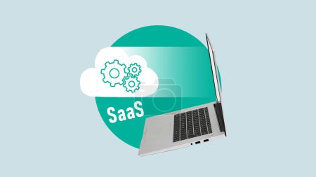 Téléchargez les photos : Le logiciel SaaS en tant que concept de service est montré en utilisant un texte et un collage avec ordinateur portable et cloud - en image libre de droit