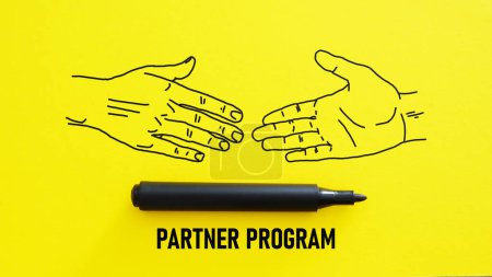 Photo for Partner program is shown using a text and picture of handshake - Royalty Free Image
