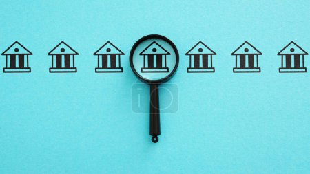 Bank research. Magnifying glass and the bank. Interest rates, investment opportunities, and regulatory changes. Valuable insights into financial products and services