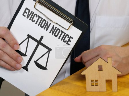 Eviction notice is shown using a text and photo of house