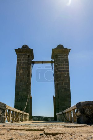 Photo for Vertical shot of Puente de las bolas, a bridge that leads to San Gabriel castle in Arrecife, Lanzarote - Royalty Free Image