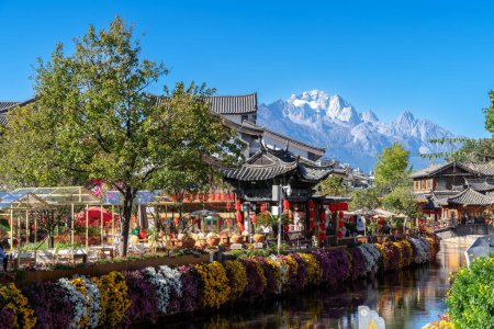 Photo for Lijiang, China - October 23,2023 : Scenic view of the Old Town of Lijiang in Yunnan, China. The Old Town of Lijiang is a UNESCO World Heritage Site and also a famous tourist destination of Asia. - Royalty Free Image