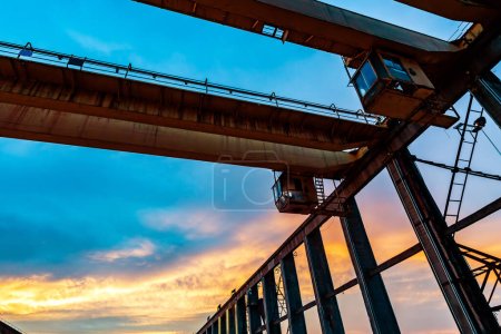 Photo for The steel structure and bridge crane of the dock are located by the Dongting Lake in Yueyang, China. - Royalty Free Image