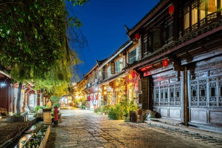 Photo for The Old Town of Lijiang is a UNESCO World Heritage Site and a famous tourist destination in Asia. Yunnan, China. - Royalty Free Image