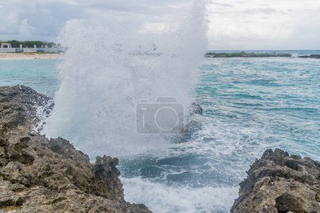 Caribbean sea waves on the shore of tropical coastline in Mexico