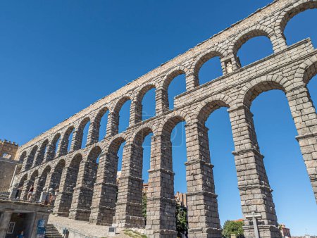 Photo for Awe-Inspiring Roman Legacy: Magnificent Segovia Aqueduct, an Imposing Engineering Marvel Built by the Mighty Roman Empire - Royalty Free Image