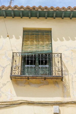 Photo for Sunlit rural streets, traditional houses lining up, the essence of historic Spain captured - Royalty Free Image