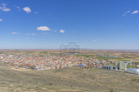 Photo for Historic mills, Spanish countryside backdrop. An elegant ballet of architecture and nature in Toledo's heart - Royalty Free Image