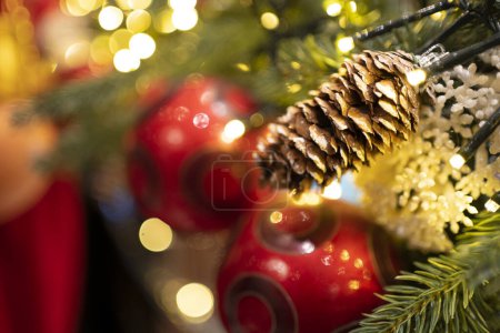 Photo for A beautifully decorated Christmas tree with sparkling lights and colorful ornaments, embodying the festive spirit - Royalty Free Image