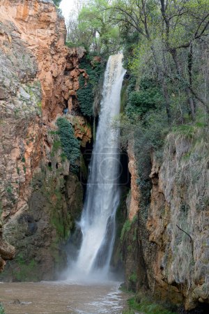 Lush greenery frames the powerful cascade at Monasterio de Piedra, a serene escape perfect for nature and travel themes.