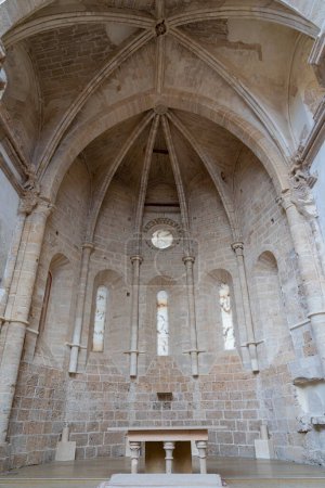 Photo for The Gothic apse and remains of an altar in the Monasterio de Piedra, framed by slender columns and lancet windows. - Royalty Free Image