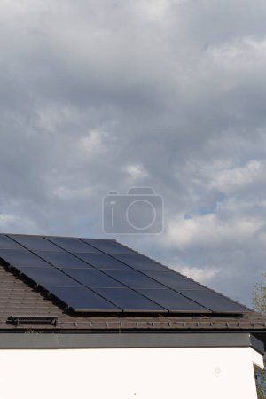 Photo for New building with solar panel on rooftop  in south germany summer blue sky day - Royalty Free Image