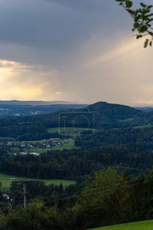 Photo for Stormy cloud weather sundown landscape evening in south germany countryside alps - Royalty Free Image