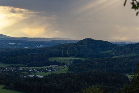 Photo for Stormy cloud weather sundown landscape evening in south germany countryside alps - Royalty Free Image