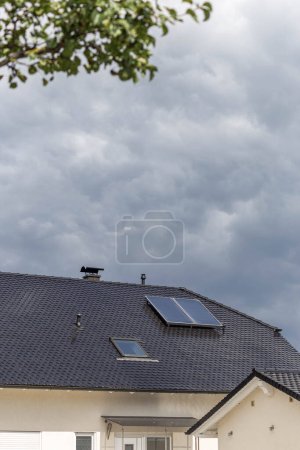 Photo for Solar panel on rooftop new building at german city in september sunshine day - Royalty Free Image
