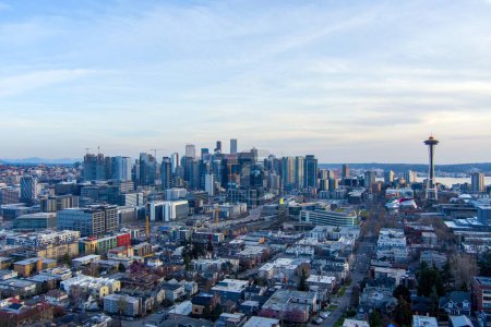 Aerial view of Seattle, Washington and Mount Rainier at sunset in March 2023