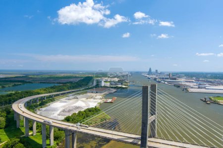 Aerial view of the Cochrane Africatown Bridge and the downtown Mobile, Alabama skyline