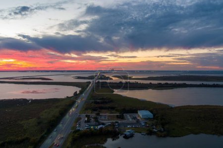 Photo for Aerial view of the Mobile Bay causeway at sunset on the Alabama Gulf Coast - Royalty Free Image