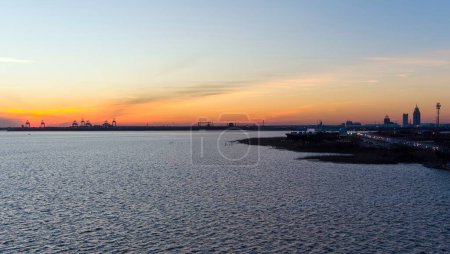 Photo for Mobile bay and the causeway at sunset on the Alabama Gulf Coast in January - Royalty Free Image