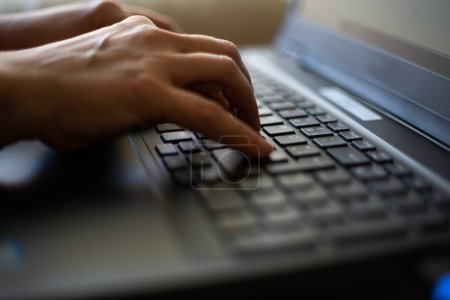 Photo for Close up of fingers working on a laptop woman - Royalty Free Image