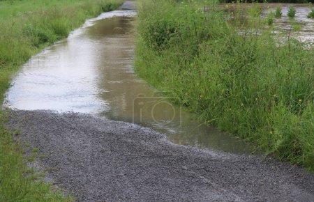 Flood water is spreading out onto Cycle path