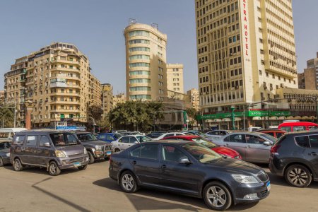 Photo for CAIRO, EGYPT - JANUARY 27, 2019: Traffic at Tahrir square in Cairo, Egypt - Royalty Free Image