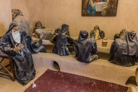 Foto de WADI NATRUN, EGYPT - JANUARY 30, 2019: Monk mannequins in the Monastery of Saint Mary El-Sourian in Wadi El Natrun, Egypt - Imagen libre de derechos