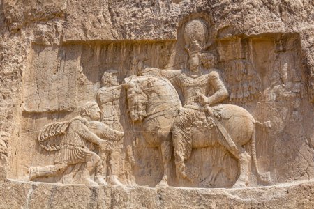 Photo for Triumph of Shapur I over the Roman emperors Valerian and Philip the Arab bas-relief in Naqsh-e Rostam, Iran - Royalty Free Image
