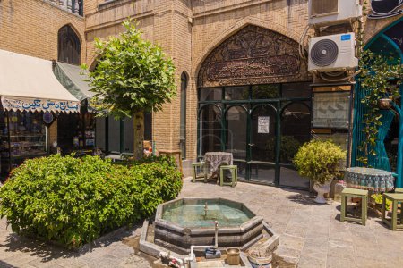 Photo for ISFAHAN, IRAN - JULY 10, 2019: Small courtyard in the center of Isfahan, Iran - Royalty Free Image