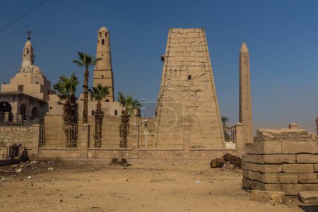 Photo for Luxor temple pylon and the Abu Haggag Mosque in Luxor, Egypt - Royalty Free Image