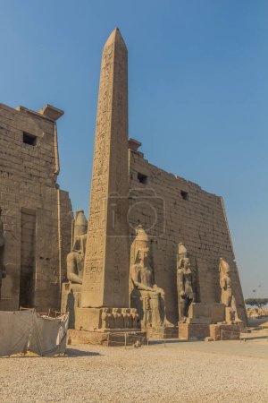 Photo for Ramesses II obelisk in front of the Luxor temple pylon, Egypt - Royalty Free Image