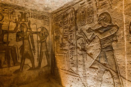 Téléchargez les photos : ABU SIMBEL, EGYPT - FEB 22, 2019: Walls of the Great Temple of Ramesses II  in Abu Simbel, Egypt. - en image libre de droit
