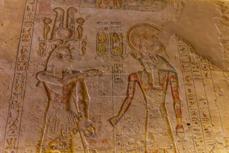Téléchargez les photos : LUXOR, EGYPT - FEB 20, 2019: The pharaoh is welcomed to the afterlife by the god Horus. Ramesses IV tomb at the Valley of the Kings at the Theban Necropolis, Egypt - en image libre de droit