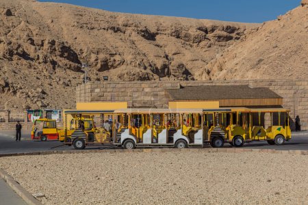 Photo for LUXOR, EGYPT - FEB 20, 2019: Toy train at the Valley of the Kings at the Theban Necropolis, Egypt - Royalty Free Image