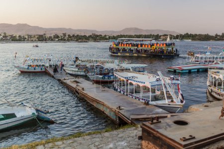 Photo for LUXOR, EGYPT - FEB 18, 2019: Ferries at the river Nile in Luxor, Egypt - Royalty Free Image
