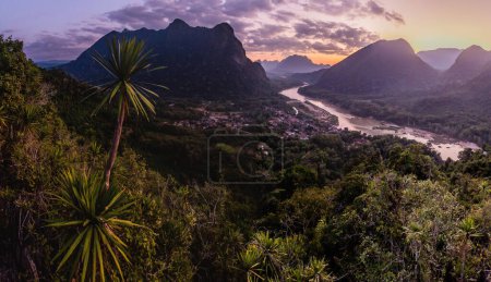 Photo for Evening aerial view of Nam Ou river and Muang Ngoi Neua village from Phanoi viewpoint, Laos - Royalty Free Image