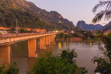 Photo for Bridge across Nam Ou river in Nong Khiaw, Laos - Royalty Free Image