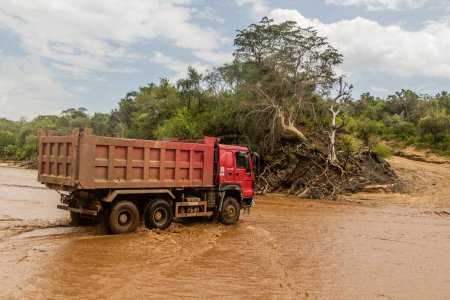 Photo for Truck crossing Kizo river, Ethiopia - Royalty Free Image