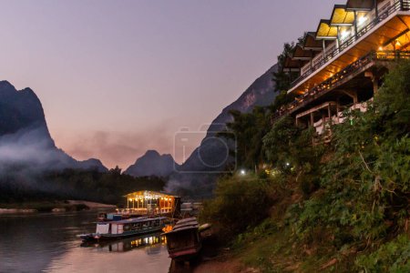 Photo for Sunset view of a riverside in Muang Ngoi Neua village, Laos - Royalty Free Image