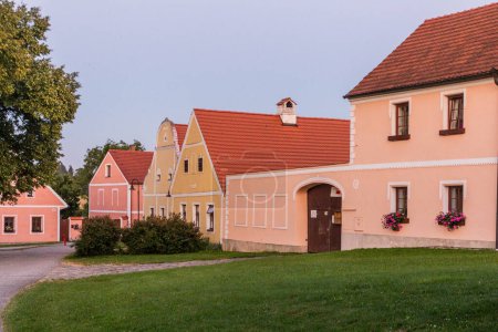 Photo for Traditional houses of rural baroque style in Holasovice village, Czech Republic - Royalty Free Image