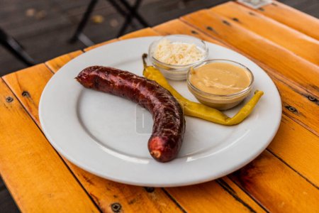 Photo for Typical Czech snack - sausage with mustard and horseradish - Royalty Free Image