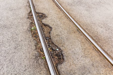 Photo for Dilapidated tram tracks in Bratislava, Slovakia - Royalty Free Image